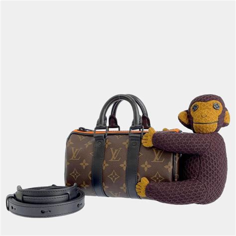 LOUIS VUITTON Monogram Monkey Puppet LV .